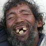 Create meme: photo of homeless man with no teeth, homeless man with no teeth smiling, a homeless person with no teeth
