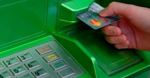 Create meme: Bank card, ATM takes denig, how to withdraw money from the card in the ATM