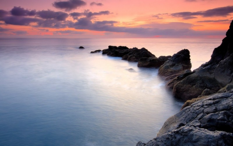 Create meme: ocean landscape, sea and rocks, sunset ocean