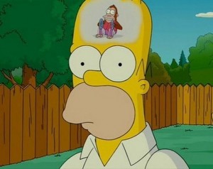 Create meme: the monkey in the head of Homer, Homer the monkey in the head, Homer