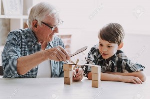 Создать мем: дедушка и внук, сюрприз для дедушки, маленький мальчик