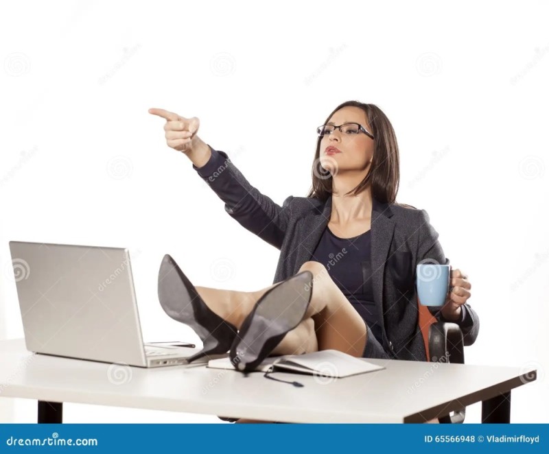 Create meme: female boss, The female boss, A business woman is sitting