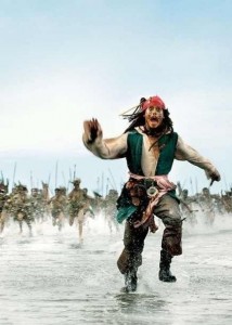 Create meme: Jack Sparrow runs, Jack Sparrow funny pictures, the natives run after Jack Sparrow