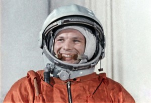 Создать мем: первый космонавт, гагарин в скафандре, гагарин в космосе