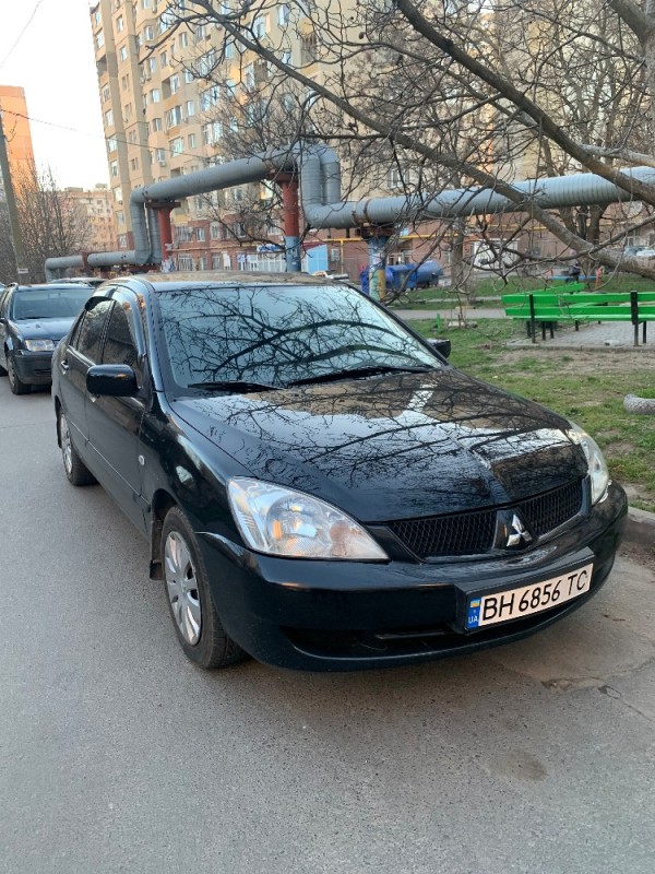 Создать мем: Mitsubishi Lancer VII, mitsubishi lancer 2006, mitsubishi lancer 2005