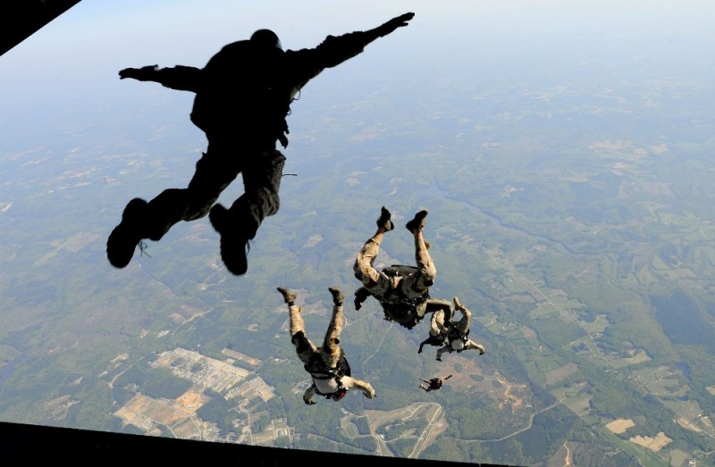 Create meme: paratroopers jump with a parachute, parachute jump, skydiving from an airplane