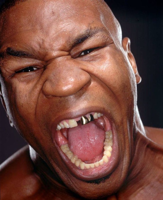 Create meme: Mike Tyson , Tyson angry, Mike Tyson grinned