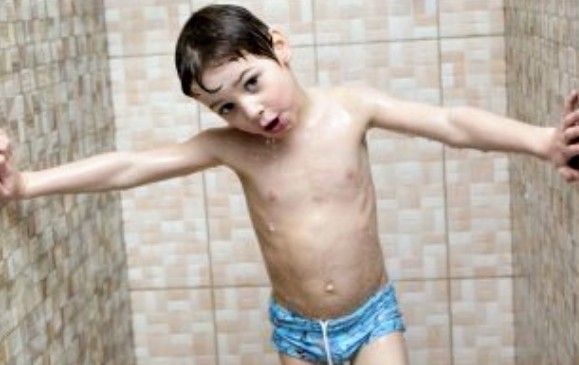 Create meme: boy , The boy is washing himself, shower boy