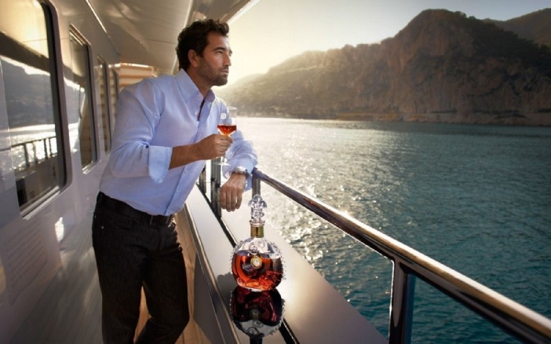 Create meme: a man on a yacht with a glass, a man on a yacht, people on the yacht