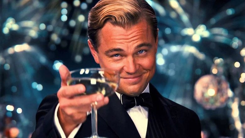Create meme: Leonardo DiCaprio raises a glass, DiCaprio Gatsby, Leonardo DiCaprio with a glass of