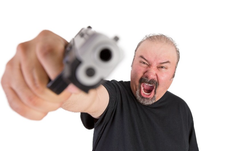 Create meme: angry guy with a gun, a man with a gun shouts, threatening with a gun
