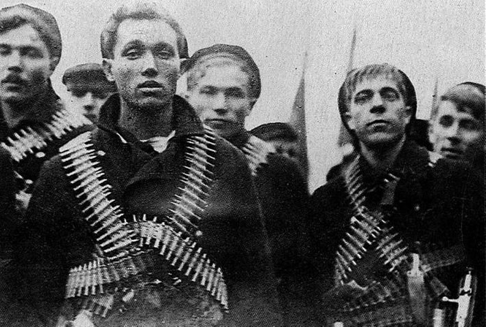 Create meme: revolutionary sailors, A revolutionary sailor with a machine gun belt, the revolution of 1917 in Russia