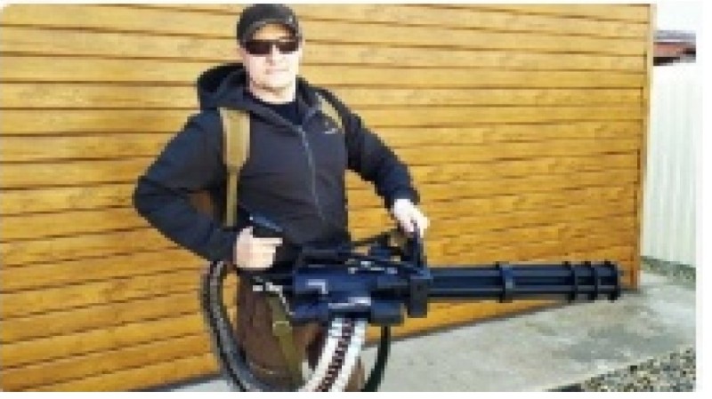 Create meme: minigun weapon, minigun with a man, M-134- six-barrel minigun