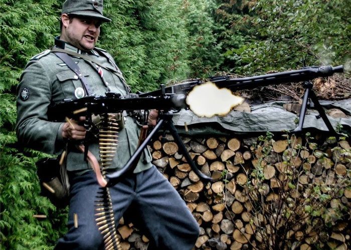 Create meme: a German with a mg 42, German machine gunner, German machine gun