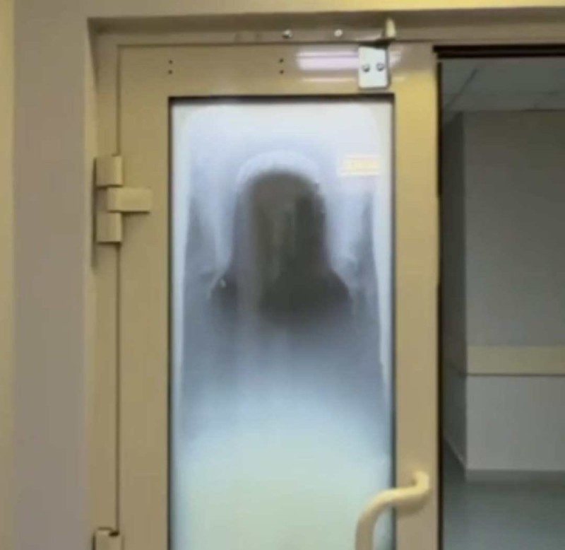 Create meme: the face of the Most holy Theotokos in the Vishnevsky hospital, darkness, the door 