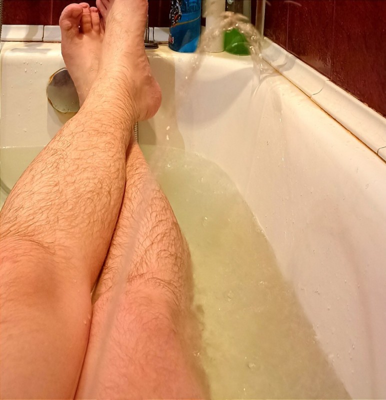 Create meme: guys' legs, men's feet in the bathroom, people 