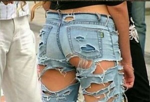 Create meme: ripped jeans listening to, holey pants photo, ripped jeans humor