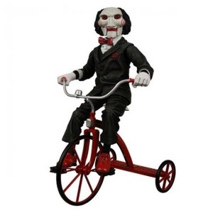 Создать мем: кукла пила, кукла билли из пилы, кукла билли пила на велосипеде