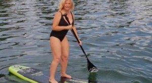 Create meme: sup, paddle boarding, Irina Gerashchenko in swimsuit