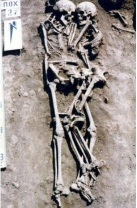Create meme: lovers' grave excavation, ancient burial, the skeleton in the grave