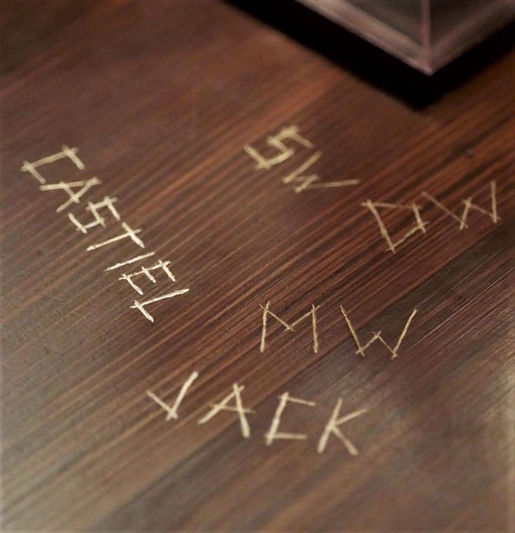 Create meme: Supernatural table with initials, laminate , The initials of Sam and Dean Winchester