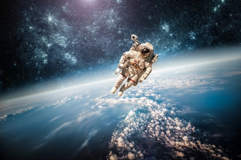Create meme: man in space , space astronaut, an astronaut in outer space