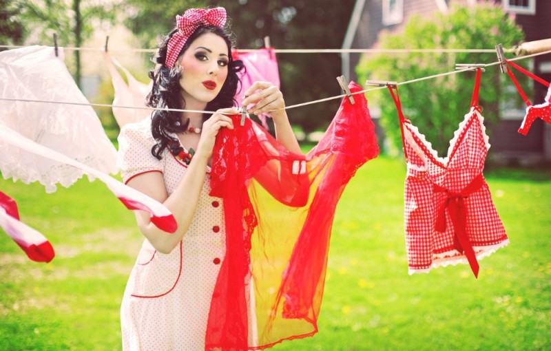 Create meme: a woman is hanging out her underwear, girl , in pin-up style 