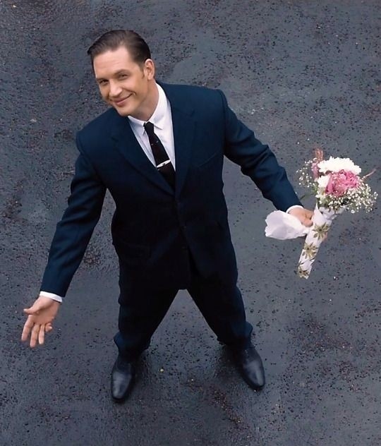 Create meme: the legend movie with tom hardy flowers, Tom hardy is a legend, tom hardy legend with flowers