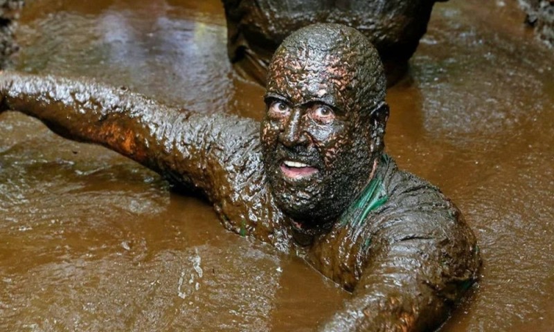 Create meme: The man is covered in mud, Out of the mud, in the mud 