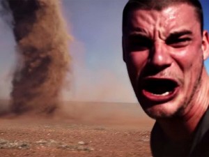 Create meme: selfi on the background of a tornado, tornado meme, the man in the background tornado