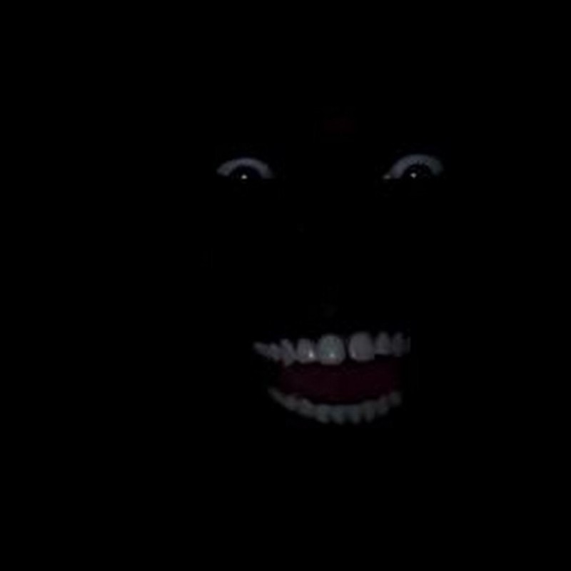 Create meme: eyes and teeth in the dark, Negro laughing in the dark, Negro in the dark 