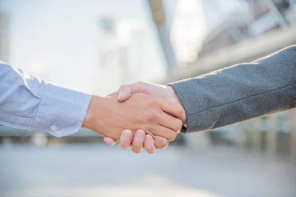 Create meme: handshake , handshake through pants, handshake business