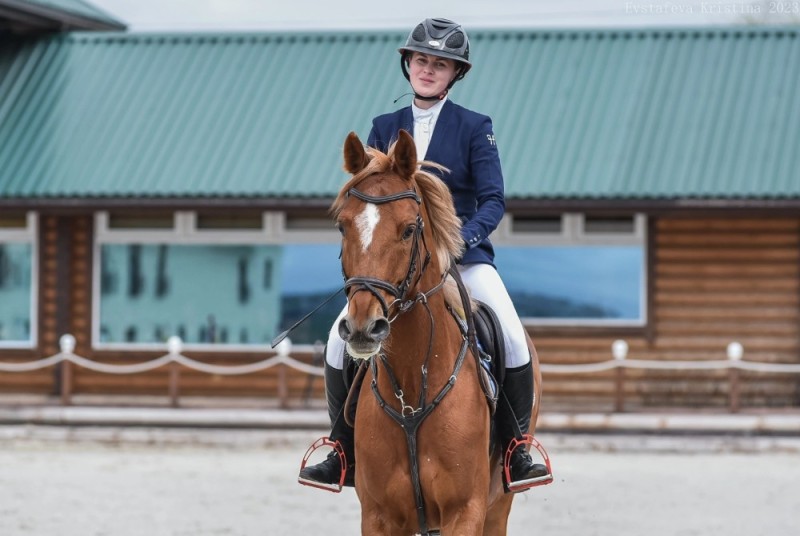 Create meme: girl , horse riding , dressage on horseback