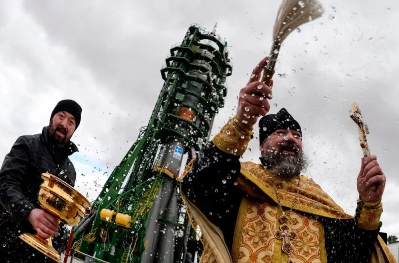 Create meme: the priest consecrates the rocket, sanctification , the priest of the Russian Orthodox Church consecrates weapons