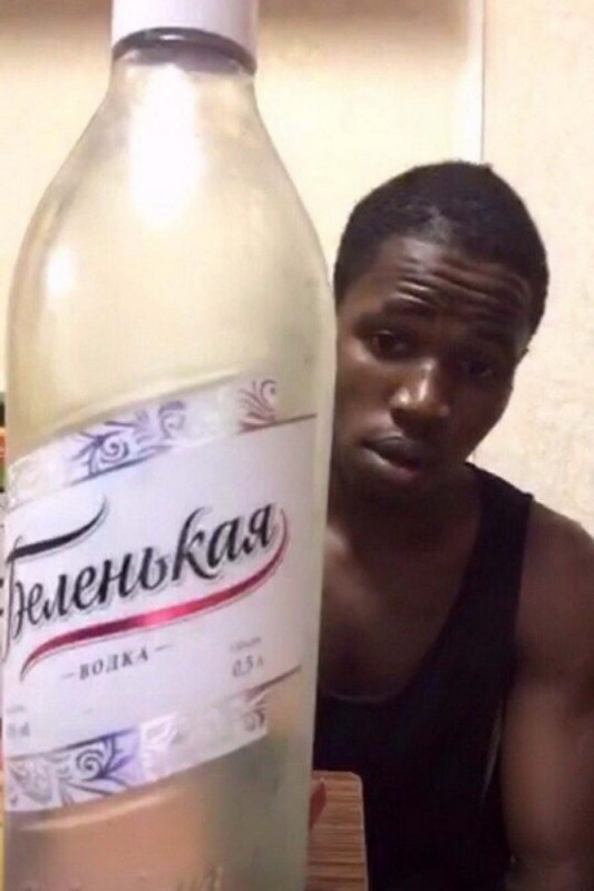 Create meme: a negro with vodka, vodka , white vodka