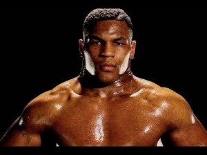 Create meme: photo of a young Mike Tyson, knockout, Kevin Rooney Tyson 1995