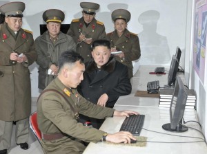 Create meme: Kim Jong-UN with the phone, Kim Jong-UN, Kim Jong
