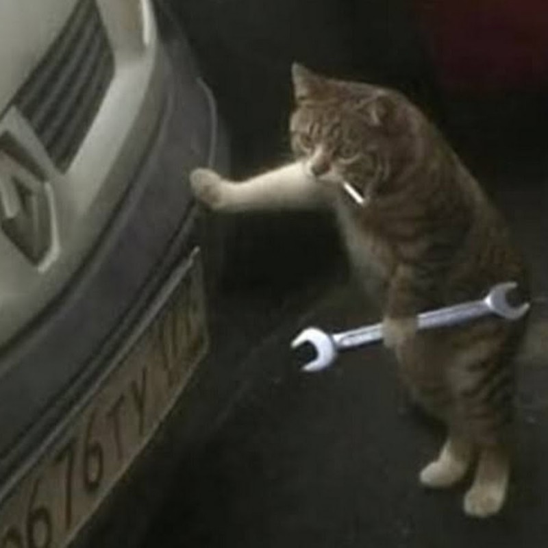 Создать мем: кот с сигаретой и гаечным ключом, кот с гаечным ключом мем, кот механик мем