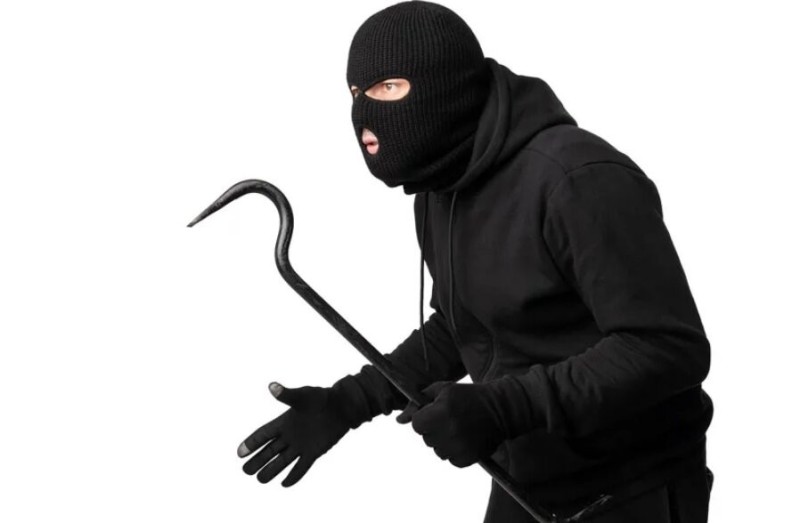Create meme: the masked robber, a robber in a mask and gloves, The masked thief
