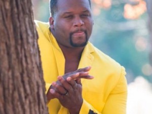 Create meme: black man in yellow jacket, meme Negro, nigger behind the tree meme