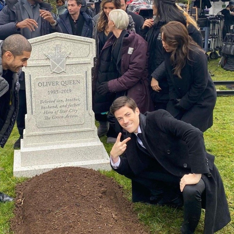 Create meme: Grant Gustin at the grave, grant gastin near the grave of Oliver, grant gastin near the grave