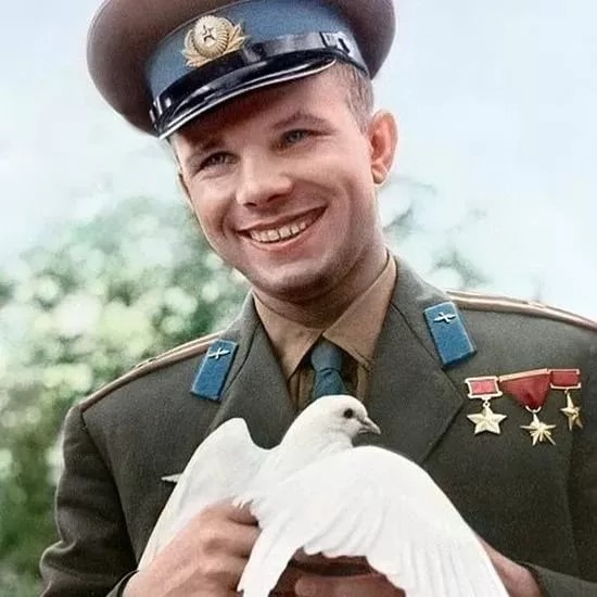 Create meme: cosmonaut Yuri Gagarin , gagarin with a pigeon, Gagarin was the first 