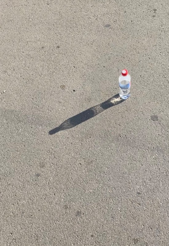 Create meme: bottle on the asphalt, bottle , water bottle
