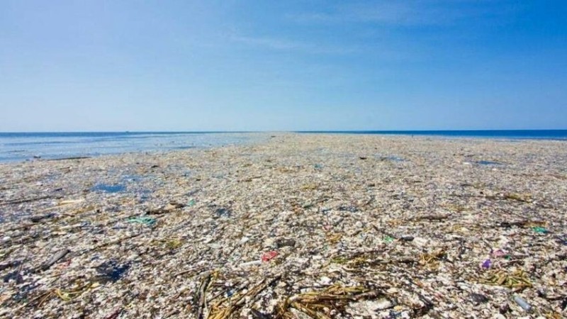 Create meme: garbage island in the Pacific ocean, garbage island in the ocean, plastic trash in the ocean
