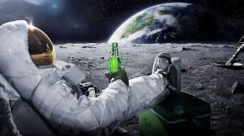 Create meme: feet , cosmonaut carlsberg, in space 