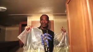 Create meme: Snoop Dogg with packages, Snoop Dogg with packages of grass, snoop dogg with 2 packs