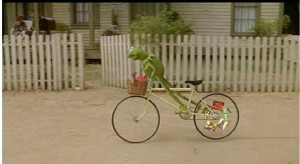 Создать мем: kermit on bicycle, езда на велосипеде, легешонок кермит на велосипеде