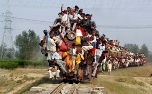 Create meme: Indian train, the train in India with people, trains in India with people on the roof