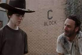 Create meme: Carl from the walking, Carl from the walking dead, the walking dead Rick and Carl meme