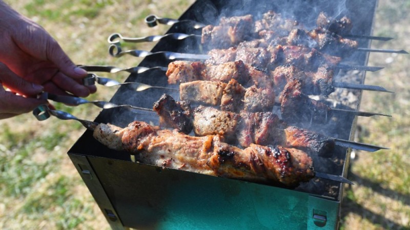 Create meme: barbecue on the table, fry the shish kebab, kebabs on the nature